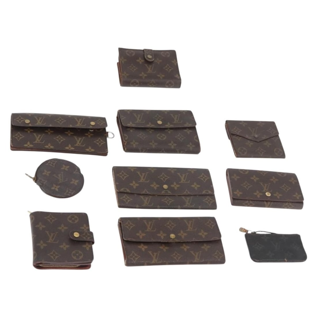 10 Piece Louis Vuitton Monogram Canvas Wallet Set: 10 Piece Louis Vuitton Monogram Canvas Wallet Set Louis Vuitton wallet in Monogram Canvas with a Monogram color finish, made in France. This item is from the women's department and is offered in heavi