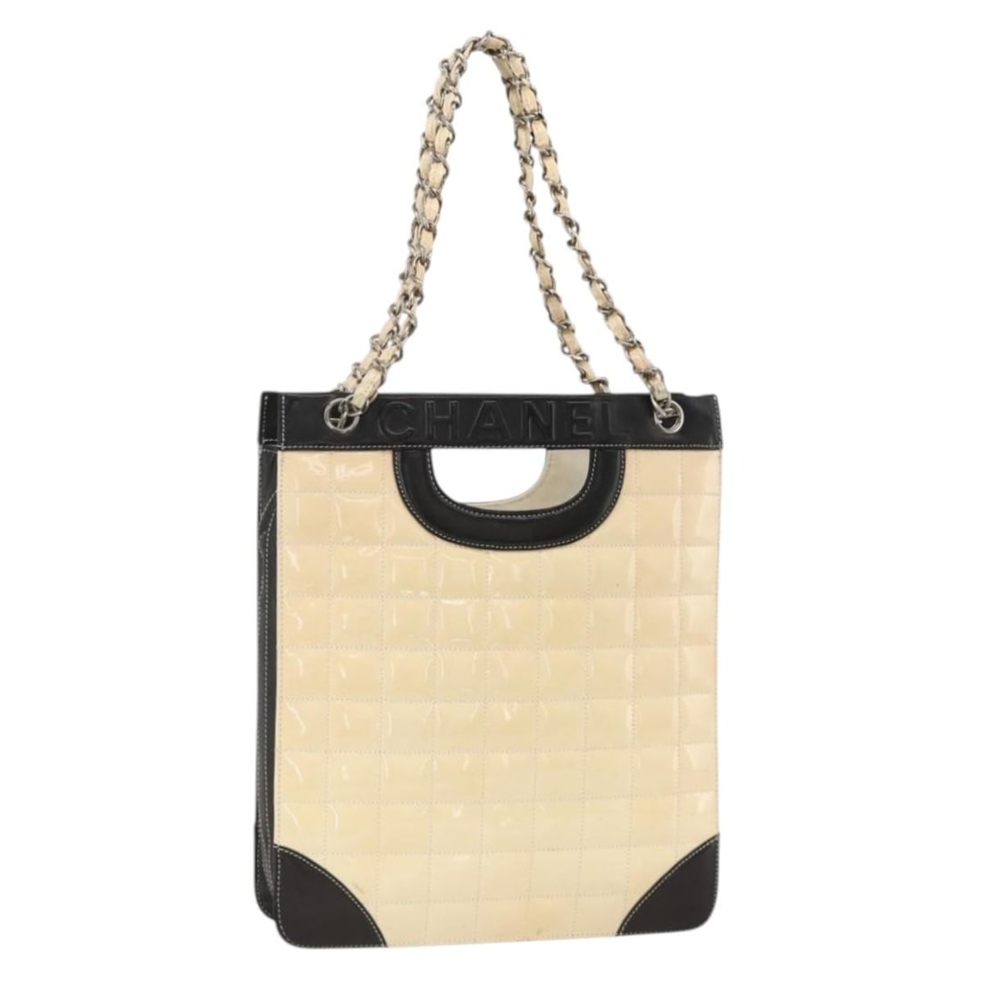 Chanel Patent Leather Choco Bar Beige Tote Shoulder Bag Silver CC: Chanel Patent Leather Choco Bar Beige Tote Shoulder Bag Silver CC This CHANEL Choco Bar Chain Shoulder Bag is crafted from beige patent leather with silver-tone accents. Designed as a tote bag, it fea