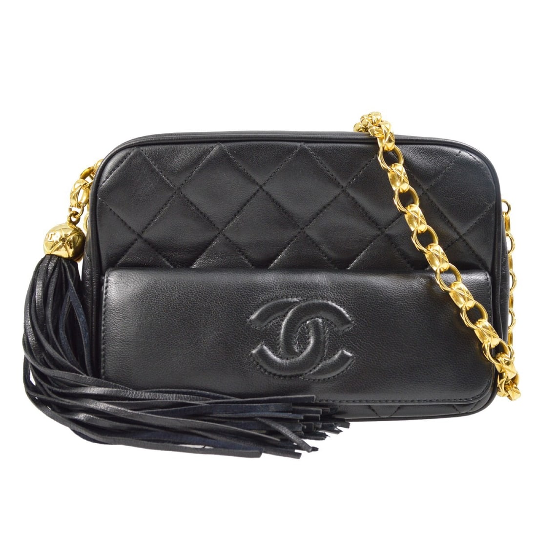 CHANEL Mademoiselle Mini Lambskin Shoulder Bag with Chain Strap: CHANEL Mademoiselle Mini Lambskin Shoulder Bag with Chain Strap Mini Chanel camera bag in black lambskin with a zip closure, chain crossbody strap, leather lining, and fringe accent. The bag features 