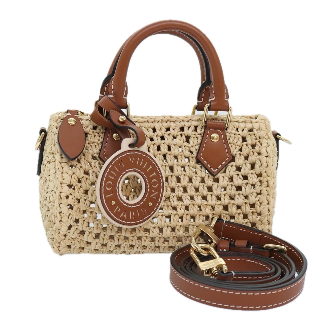 Louis Vuitton M83525 Nano Speedy Beige Leather Handbag with Strap Charm: Louis Vuitton M83525 Nano Speedy Beige Leather Handbag with Strap Charm Louis Vuitton Nano Speedy handbag in beige leather with a compact structured silhouette. This women's bag includes a dust bag, i