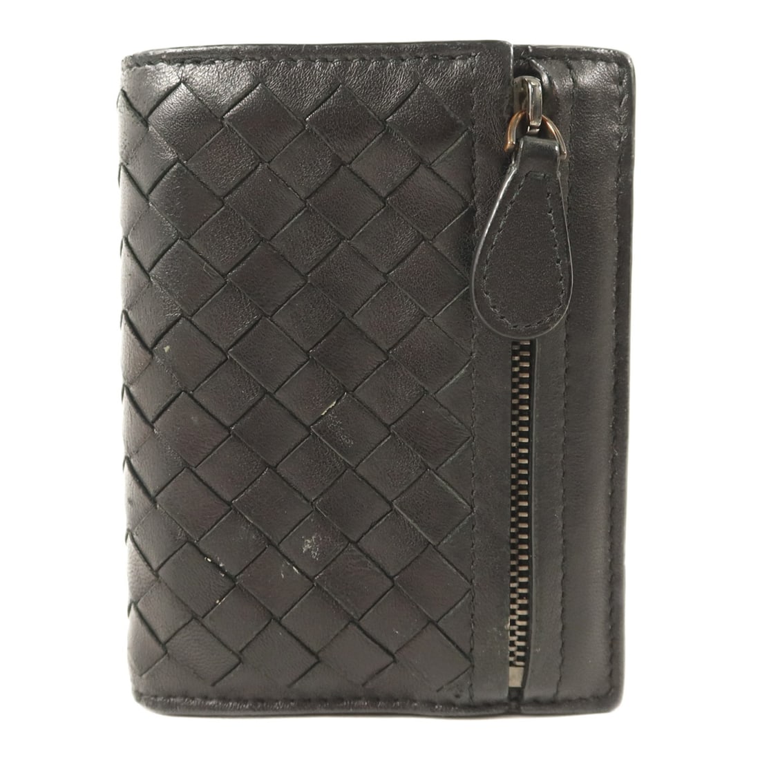 Bottega Veneta BV Black Lambskin Bi Fold Wallet for Men: Bottega Veneta BV Black Lambskin Bi Fold Wallet for Men A Bottega Veneta bi-fold wallet made from black lambskin (sheep leather). Designed for men, it features a regular size and includes a hook butto