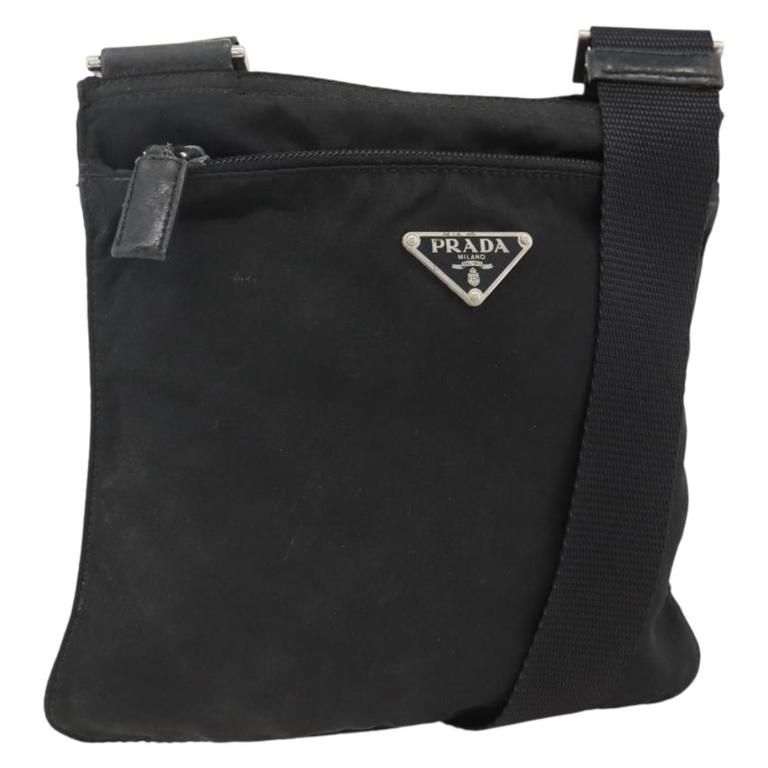 Women's Prada Black Nylon Shoulder Purse with Silver Tone Hardware: Women's Prada Black Nylon Shoulder Purse with Silver Tone Hardware This PRADA shoulder bag is crafted from durable black nylon with silver-tone accents. Designed for women, it features an adjustable s