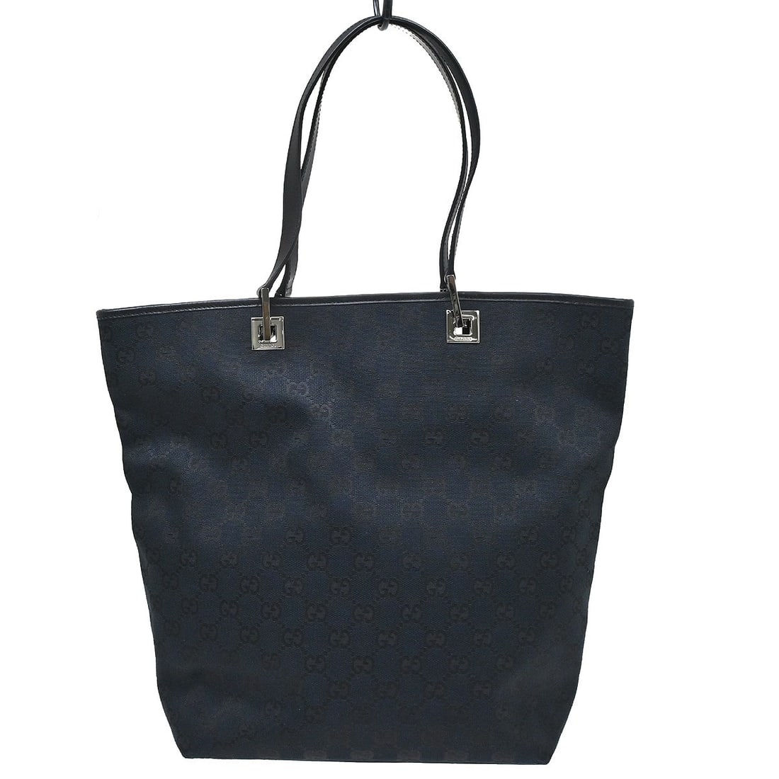 Gucci GG Medium Black Canvas Leather Tote Handbag: Gucci GG Medium Black Canvas Leather Tote Handbag Vintage Gucci GG tote bag in black, made from canvas and leather. It features the Gucci GG pattern, a medium size profile, and a black lining. The bag