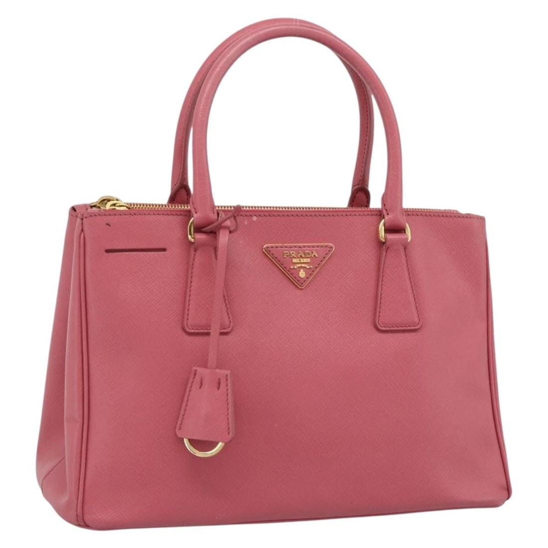 PRADA Galleria Saffiano Leather Hand Bag Pink with Clochette: PRADA Galleria Saffiano Leather Hand Bag Pink with Clochette PRADA Galleria handbag in pink Saffiano leather with clochette. Made in Italy, this women's handbag is a heavily used piece with visible we