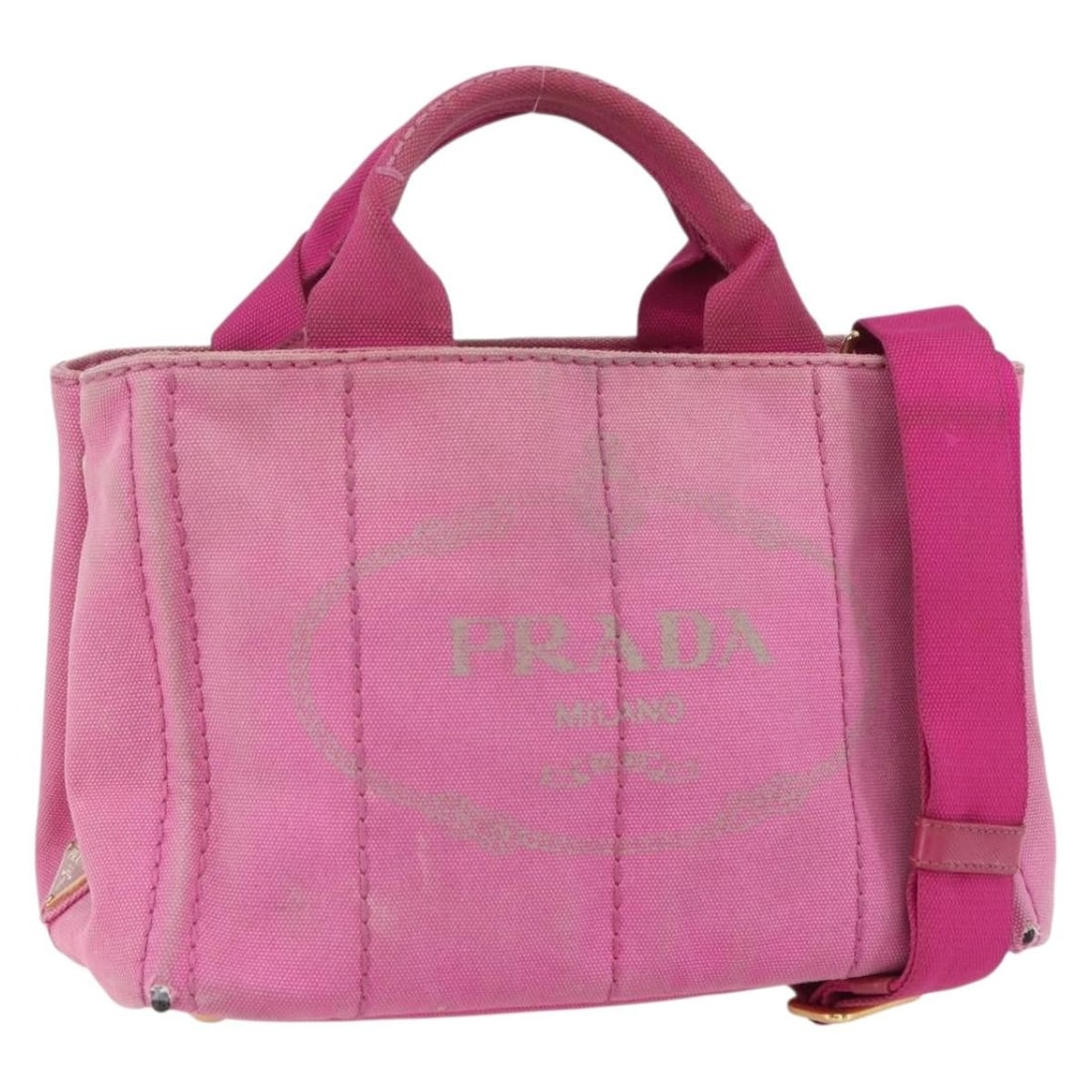 PRADA Canapa PM Pink Gold Canvas Hand Bag with Shoulder Strap: PRADA Canapa PM Pink Gold Canvas Hand Bag with Shoulder Strap This PRADA Canapa PM Hand Bag is a stylish accessory crafted from durable canvas, featuring a chic pink and gold color combination. The ba
