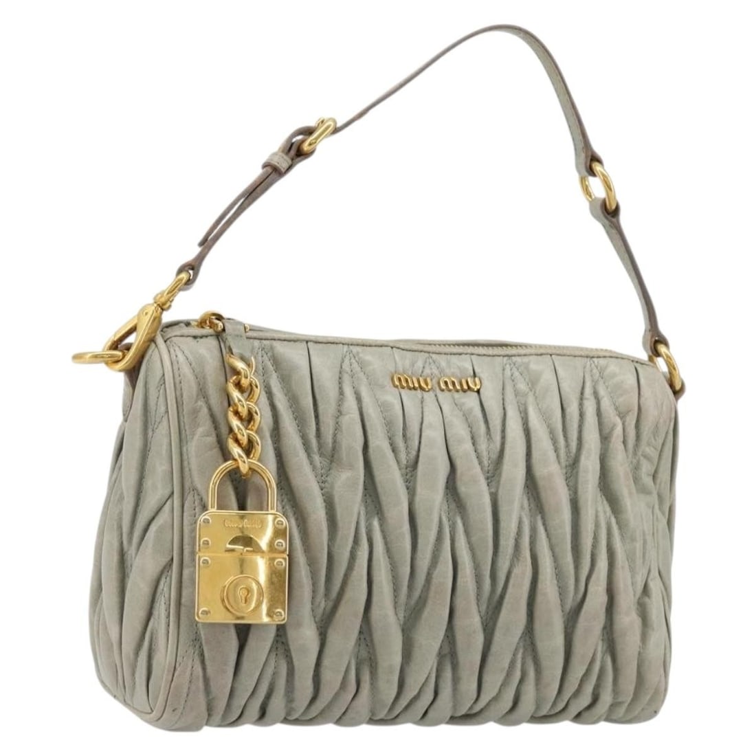 Miu Miu Leather Accessory Pouch Gray with Gold Tone Dust Bag: Miu Miu Leather Accessory Pouch Gray with Gold Tone Dust Bag Miu Miu Matelasse accessory pouch in leather, presented in gray with gold-tone accents. Made in Turkey, this women's pouch measures approxi