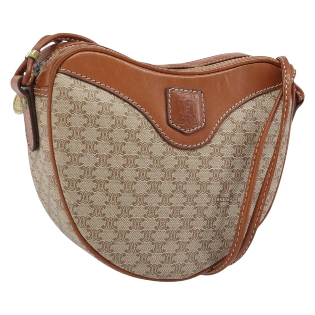 CELINE Macadam Shoulder Bag in Beige PVC Leather with Dust Bag: CELINE Macadam Shoulder Bag in Beige PVC Leather with Dust Bag Celine Macadam canvas shoulder bag in beige and gold with PVC leather trim. Made in Italy, this women's shoulder bag includes a dust bag.