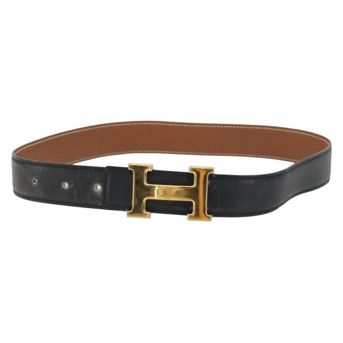 Hermes Constance H leather belt black and gold 31.9 in: Hermes Constance H leather belt black and gold 31.9 in Hermes Constance H belt in black leather with gold-tone detailing. Made in France, this women's belt is heavily used and shows shape loss, rubbin