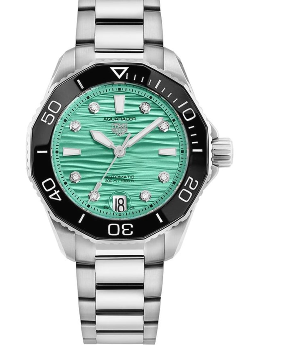 Tag Heuer Aquaracer Lady stainless steel watch turquoise dial WBP231K.BA0618: Tag Heuer Aquaracer Lady stainless steel watch turquoise dial WBP231K.BA0618 Tag Heuer Aquaracer Lady wristwatch featuring a turquoise dial, rotating bezel, and stainless steel bracelet. Includes card