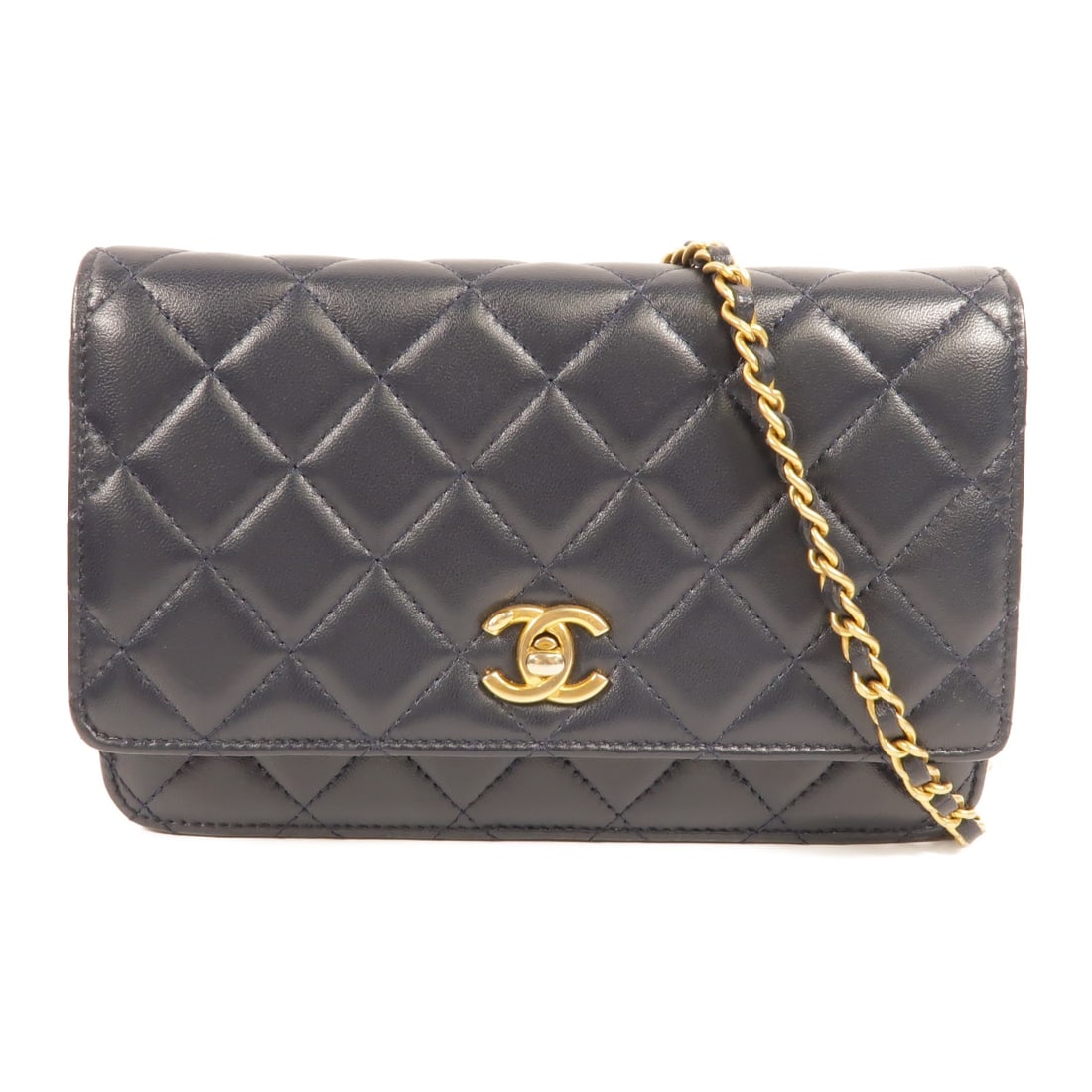 CHANEL WOC Wallet On Chain Lambskin Shoulder Bag Navy Gold Ball: CHANEL WOC Wallet On Chain Lambskin Shoulder Bag Navy Gold Ball A CHANEL Wallet on Chain shoulder bag in navy lambskin leather with gold-tone hardware and a gold ball chain detail. It features a compa