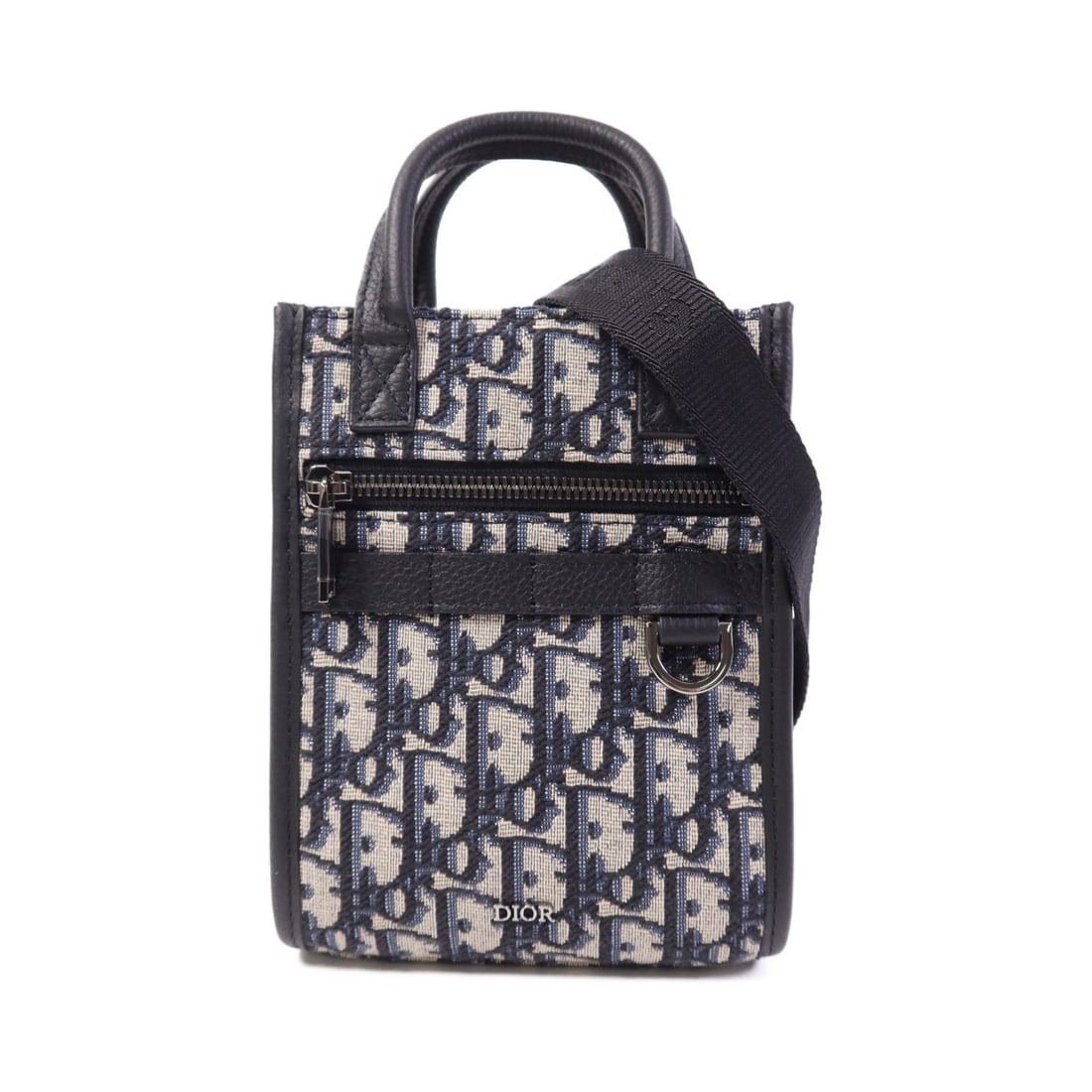 Dior Safari 2-Way Shoulder Bag 2ESW017YKY_H03E Navy Canvas Calfskin: Dior Safari 2-Way Shoulder Bag 2ESW017YKY_H03E Navy Canvas Calfskin A Christian Dior Safari shoulder bag in navy, made from calfskin (cowhide) and canvas. This 2-way shoulder bag features a zip pocket