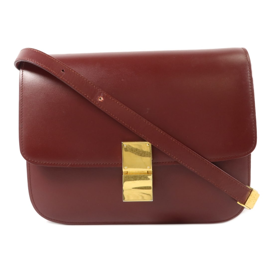CELINE Classic Box Medium Red Calfskin Shoulder Bag: CELINE Classic Box Medium Red Calfskin Shoulder Bag A CELINE Classic Box medium shoulder bag in red calfskin leather, designed for women. It features a flap closure, two open interior pockets, and one