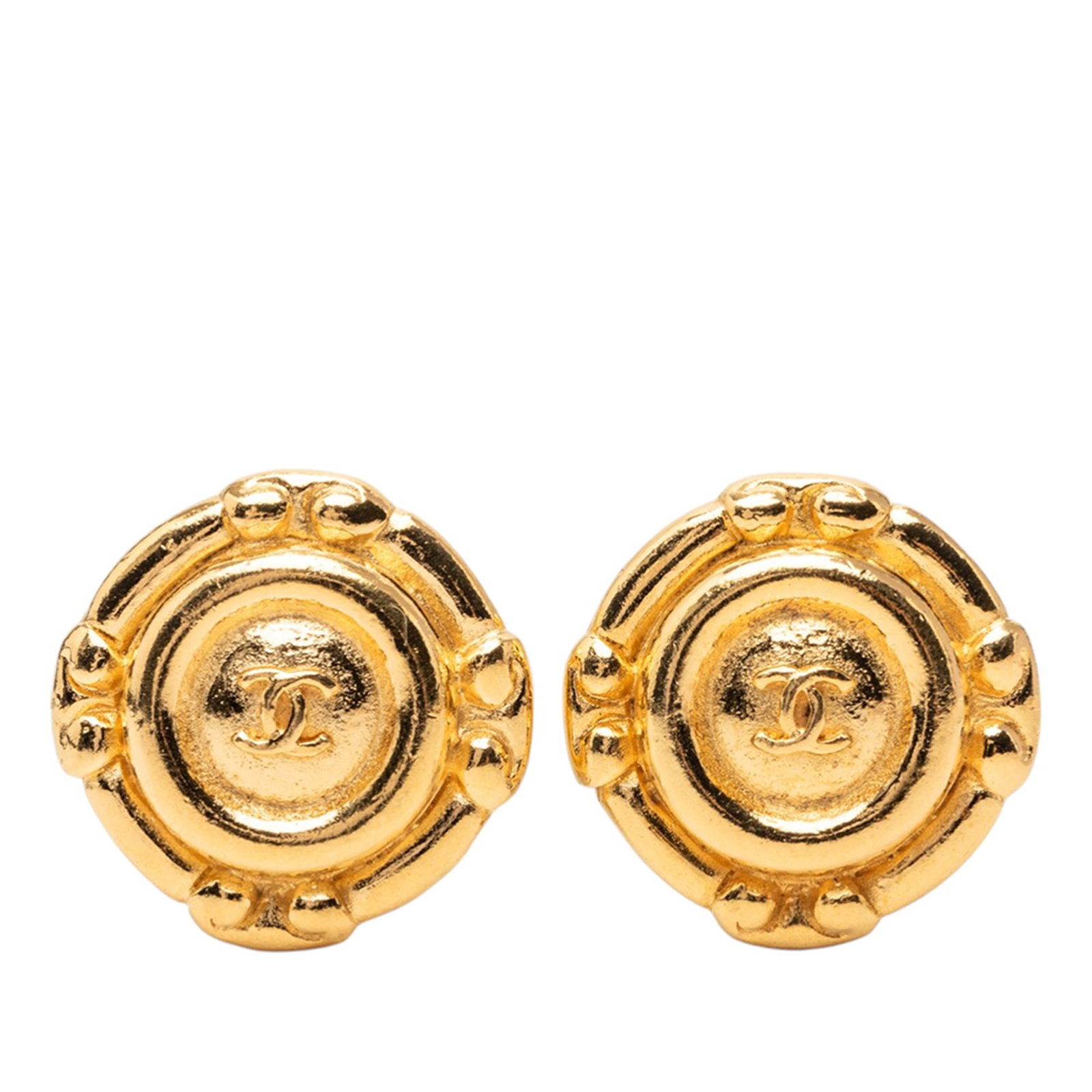 Chanel CC Logo Round Clip Earrings in Gold Plated Metal: Chanel CC Logo Round Clip Earrings in Gold Plated Metal These Chanel earrings feature a round design with the iconic CC logo and are crafted from gold plated metal. They have a clip-on closure,