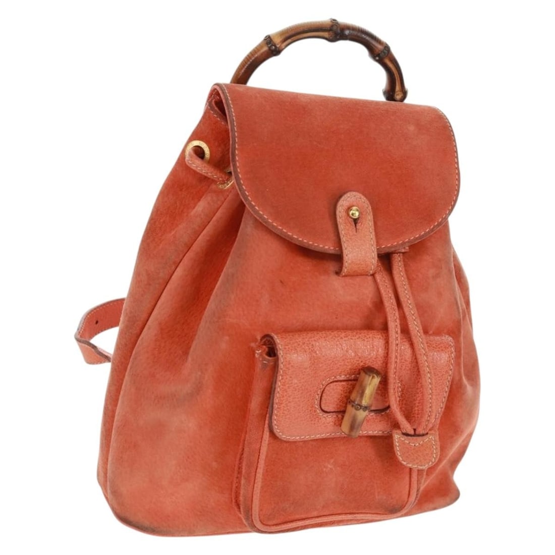 Orange Suede Bamboo Backpack by Gucci Model 003 58 0030: Orange Suede Bamboo Backpack by Gucci Model 003 58 0030 This GUCCI bamboo backpack features orange suede with gold-tone accents. The compact design includes a bamboo handle, adjustable shoulder straps