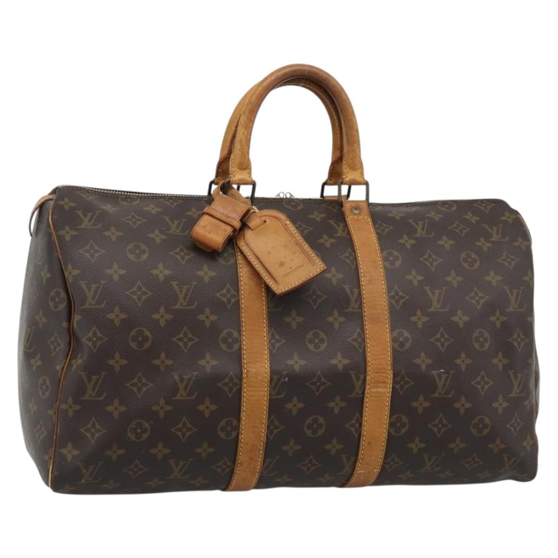 Louis Vuitton Keepall 50 Monogram Canvas Boston Bag M41426 France: Louis Vuitton Keepall 50 Monogram Canvas Boston Bag M41426 France Louis Vuitton Keepall 50 Boston bag in Monogram canvas. This heavily used piece includes a name tag and Powanie, with visible wear thr