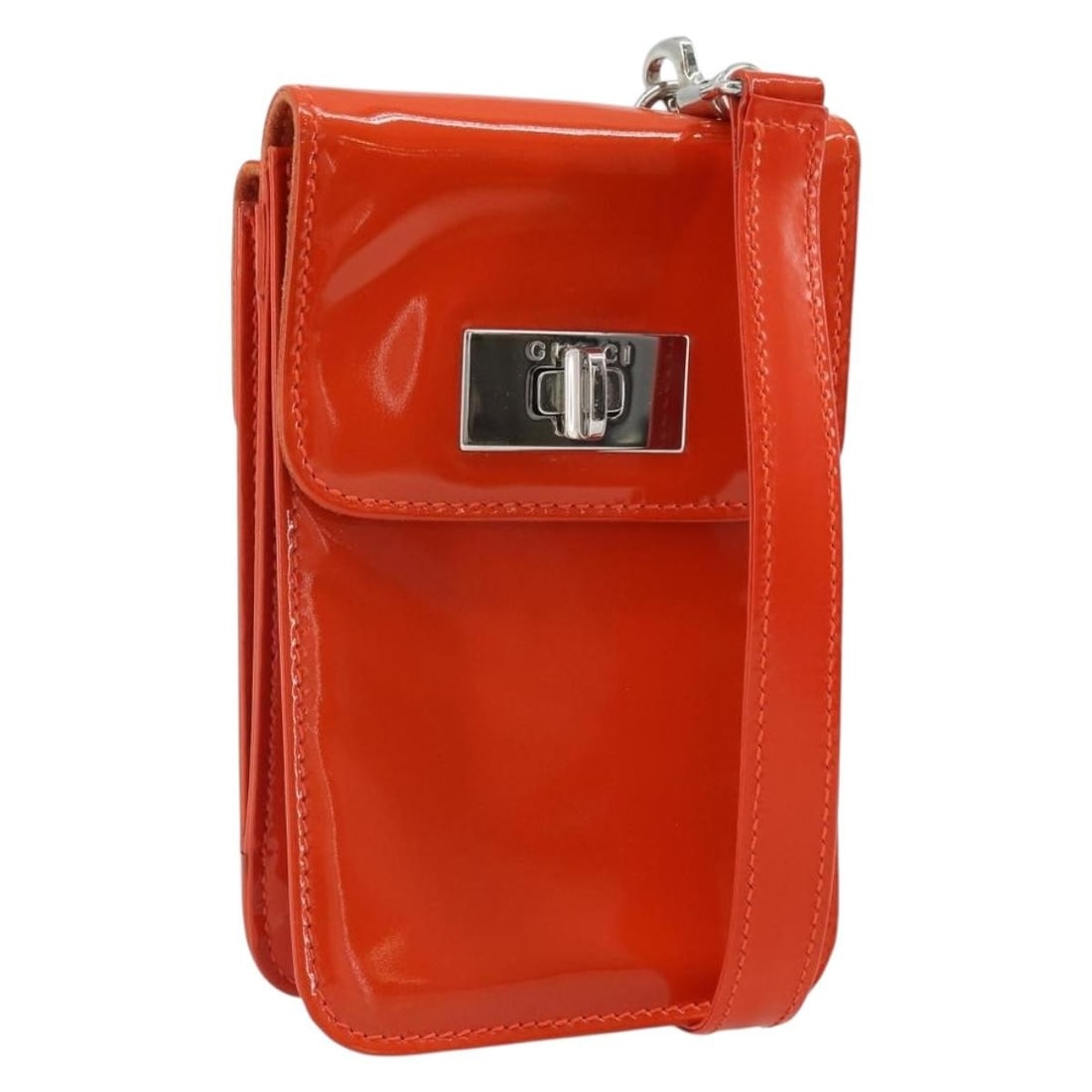Gucci 171407 Patent Leather Shoulder Bag in Orange and Silver: Gucci 171407 Patent Leather Shoulder Bag in Orange and Silver Authentic Gucci shoulder bag in orange and silver patent leather. This women's bag is made in Italy and features an adjustable shoulder st