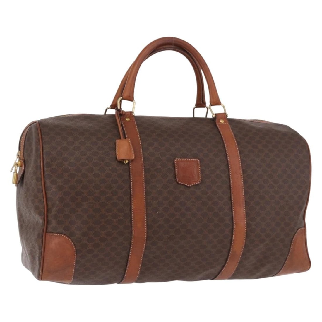 CELINE Macadam Boston Bag Brown PVC Leather with Padlock Keys: CELINE Macadam Boston Bag Brown PVC Leather with Padlock Keys Authentic CELINE Boston bag in brown Macadam canvas with PVC leather trim and gold-tone accents. This women's bag is made in Italy and inc