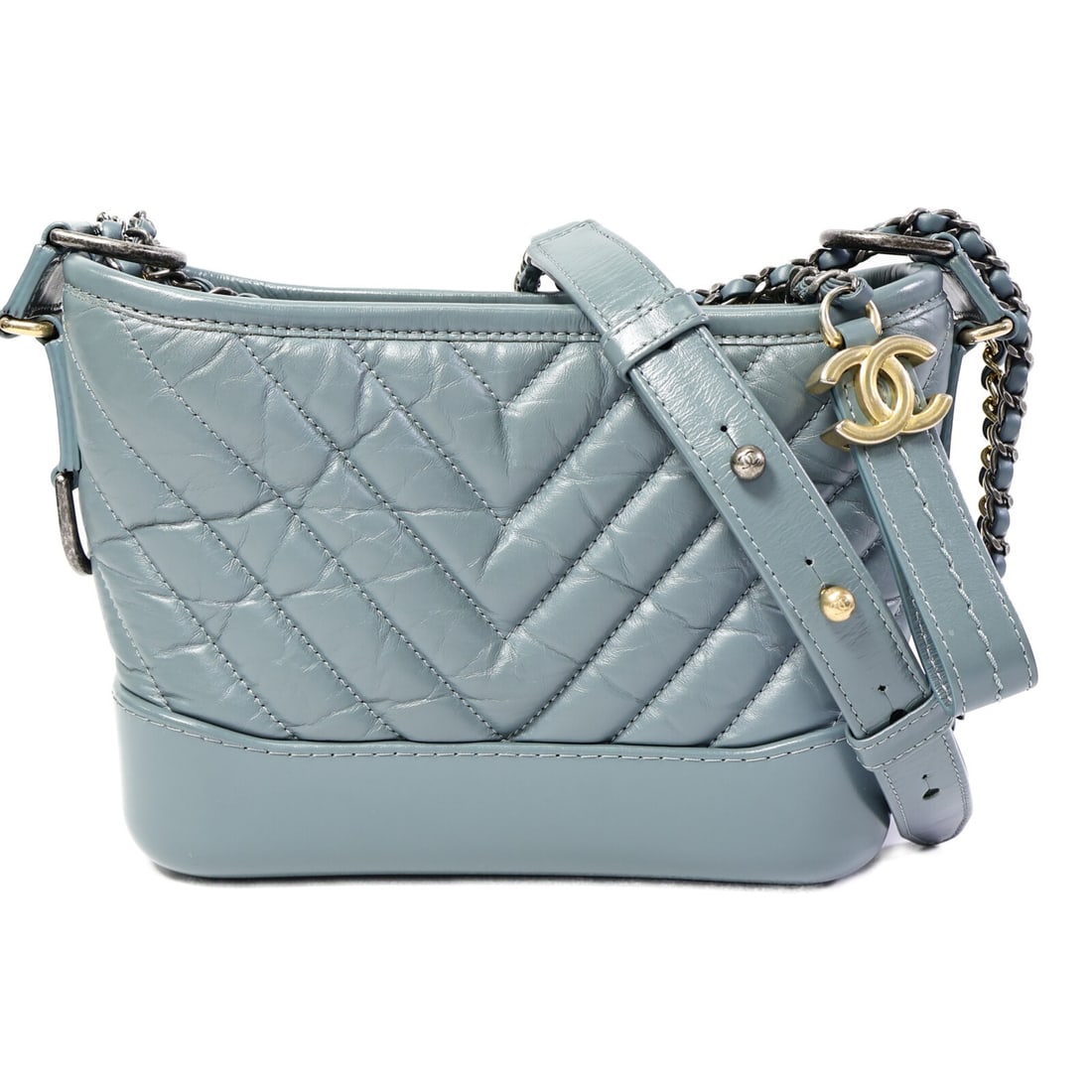 CHANEL Gabrielle Small Shoulder Bag Blue Calfskin Chain Strap: CHANEL Gabrielle Small Shoulder Bag Blue Calfskin Chain Strap A CHANEL CC Gabrielle small chain shoulder bag in blue calfskin leather. It features a chain shoulder strap, a fastener closure, and one i