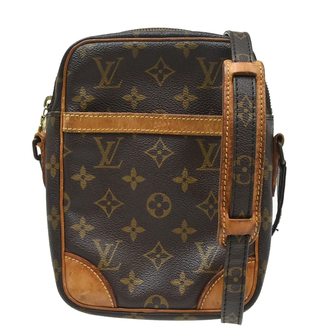 Louis Vuitton Danube Monogram Canvas Crossbody Bag M45266: Louis Vuitton Danube Monogram Canvas Crossbody Bag M45266 Vintage Louis Vuitton Danube crossbody shoulder bag in brown monogram canvas with leather trim. This medium bag features a zip closure, adjust