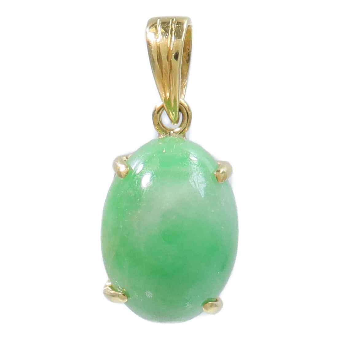 Green Jade Pendant in 18K Yellow Gold: Green Jade Pendant in 18K Yellow Gold Jade pendant top in 18K yellow gold with jade. It is described as green in color and comes with no accessories. Condition is listed as B: reasonable wear and tear