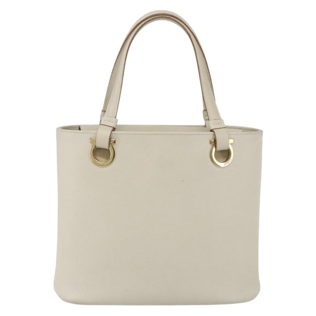 White Leather Handbag Salvatore Ferragamo Gancini Italy: White Leather Handbag Salvatore Ferragamo Gancini Italy This Salvatore Ferragamo Gancini handbag is crafted from white leather and designed for women. The bag features the signature Gancini style and 