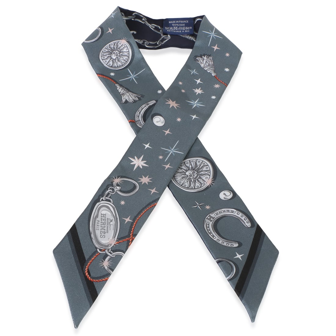 Hermes Twilly silk scarf in Ardoise Rose Marine C'est la Fete: Hermes Twilly silk scarf in Ardoise Rose Marine C'est la Fete Hermes C'est la Fete Twilly scarf in silk, featuring an Ardoise Rose Marine colorway. This pre-owned unisex accessory includes the retail 