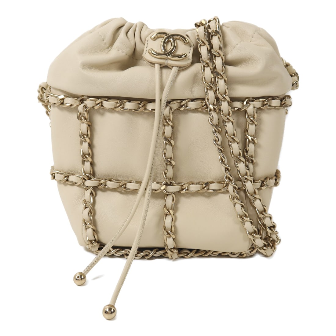 CHANEL CC Bucket Chain Shoulder Bag Beige Lambskin GHW: CHANEL CC Bucket Chain Shoulder Bag Beige Lambskin GHW CHANEL CC GHW Bucket Chain Shoulder Bag in beige lambskin (sheep leather). This women's shoulder bag is made in France, with a beige frame color 