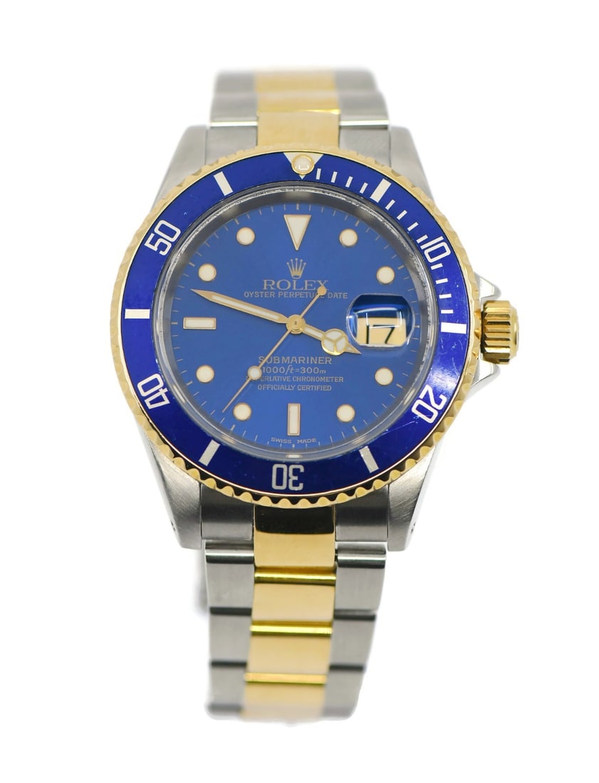 Rolex Submariner 18K Stainless Steel Watch 16613 with Box and Papers: Rolex Submariner 18K Stainless Steel Watch 16613 with Box and Papers This exquisite Rolex Submariner wristwatch combines luxurious 18K gold with durable stainless steel, making it a timeless piece for
