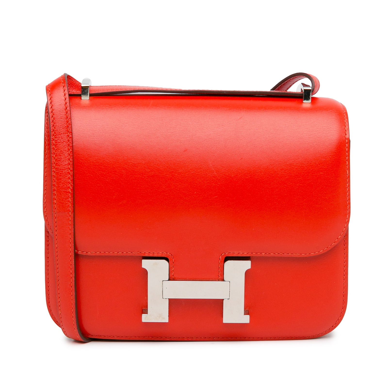 Hermes Mini Tadelakt Constance 18 Rouge Tomate Leather Handbag: Hermes Mini Tadelakt Constance 18 Rouge Tomate Leather Handbag Introducing the Hermes Mini Tadelakt Constance 18, a stunning handbag crafted from luxurious Tadelakt leather in a vibrant Rouge Tomate c