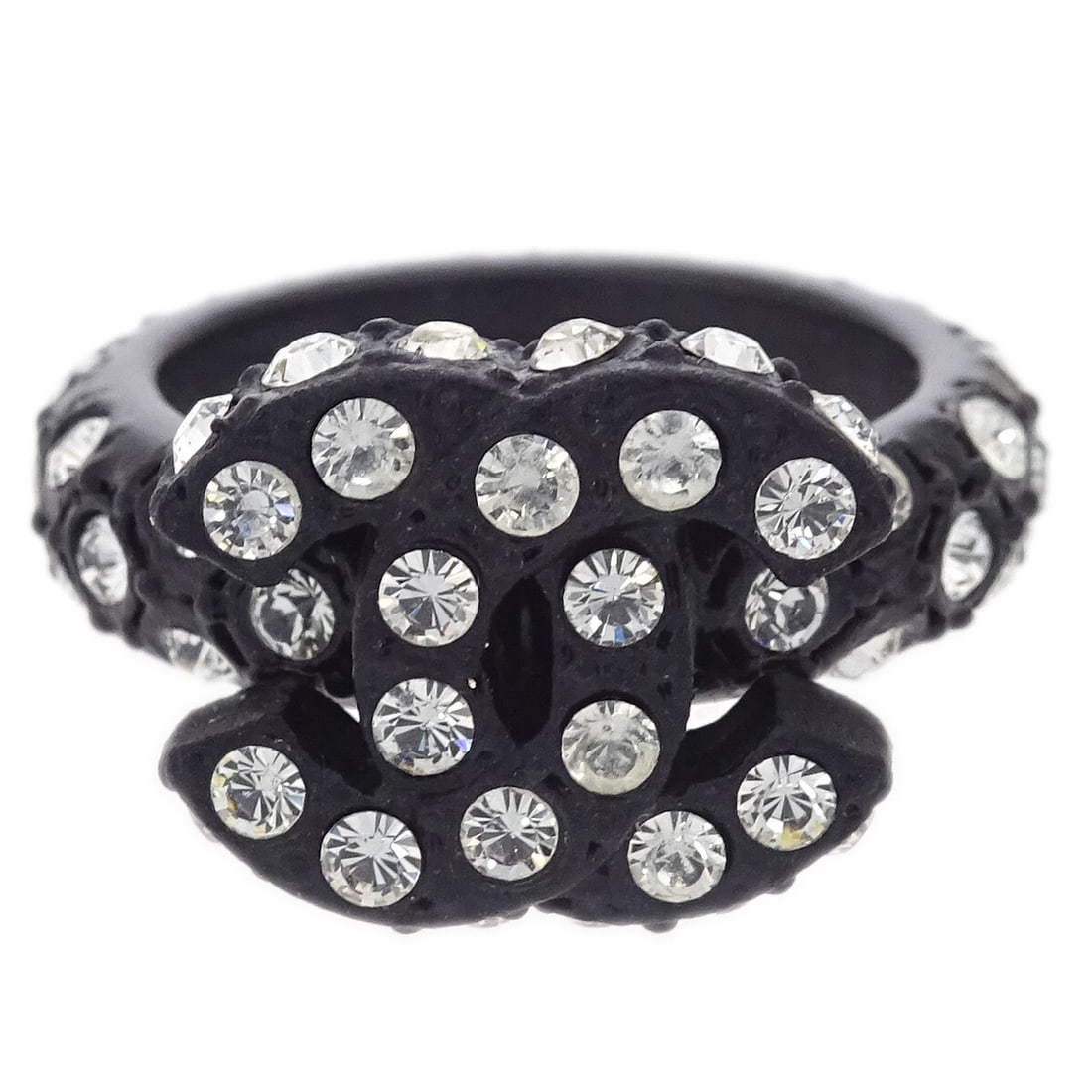 Vintage Chanel Logo Ring Black Rhinestone Size 14 France: Vintage Chanel Logo Ring Black Rhinestone Size 14 France A Chanel ring in black with rhinestone detailing, made in France. The ring is described as vintage and in very good condition. It has an inner 