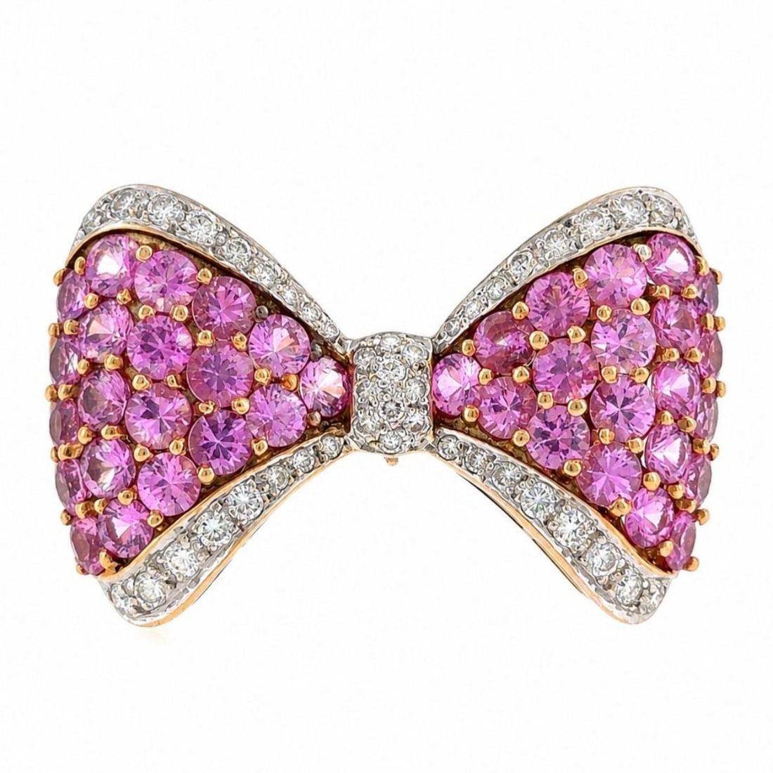 Ribbon Brooch in 18K Yellow Gold with Pink Sapphires and Diamonds: Ribbon Brooch in 18K Yellow Gold with Pink Sapphires and Diamonds Elegant ribbon brooch crafted in 18K yellow gold and set with pink sapphires and diamonds. This pre-owned piece features a flowing rib