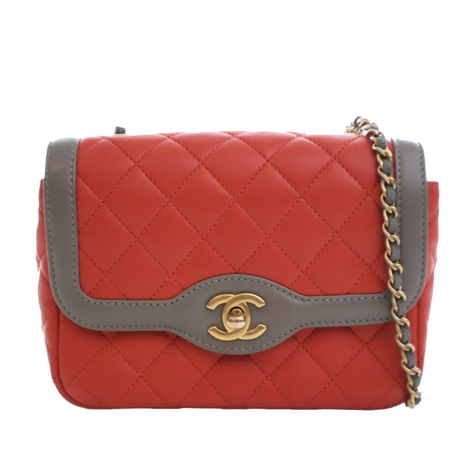 Chanel Mini Quilted Lambskin Two Tone Day Flap Red Bag: Chanel Mini Quilted Lambskin Two Tone Day Flap Red Bag This Chanel Mini Quilted Lambskin Two Tone Day Flap crossbody bag showcases a luxurious quilted leather body in a striking red color. It features