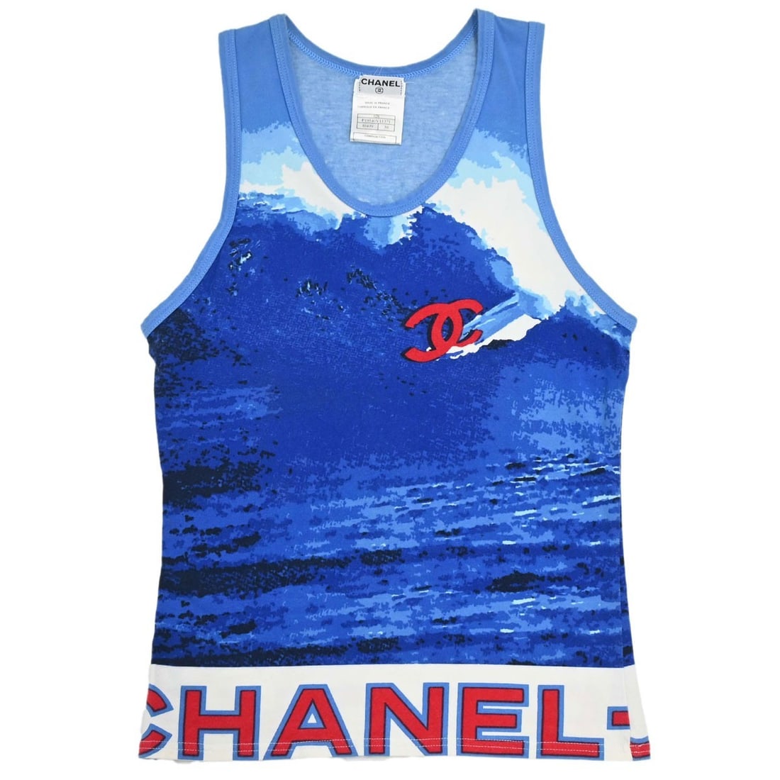 CHANEL Surf Line Blue Cotton Blend Tank Top Womens FR 36: CHANEL Surf Line Blue Cotton Blend Tank Top Womens FR 36 Chanel Surf Line sleeveless tank top in blue and white, made from 92% cotton and 8% spandex. It features a round neckline, regular fit, and log