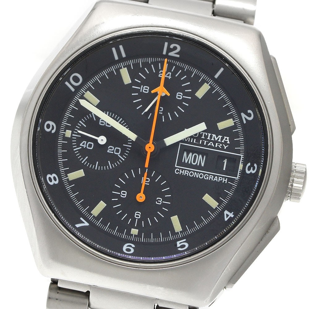 Tutima 798-02 Military Chronograph automatic mens wristwatch day date: Tutima 798-02 Military Chronograph automatic mens wristwatch day date Pre-owned Tutima Military Chronograph day-date men's wristwatch with automatic movement and a black dial. This watch-only offering