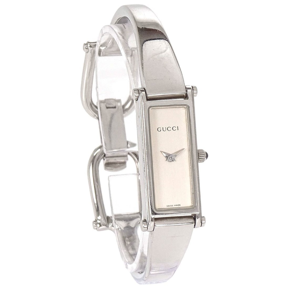 Gucci 1500L Womens Stainless Steel Quartz Wristwatch Swiss Made: Gucci 1500L Womens Stainless Steel Quartz Wristwatch Swiss Made Gucci 1500L women's quartz wristwatch with a rectangular stainless steel case and stainless steel bracelet. This analog watch features a