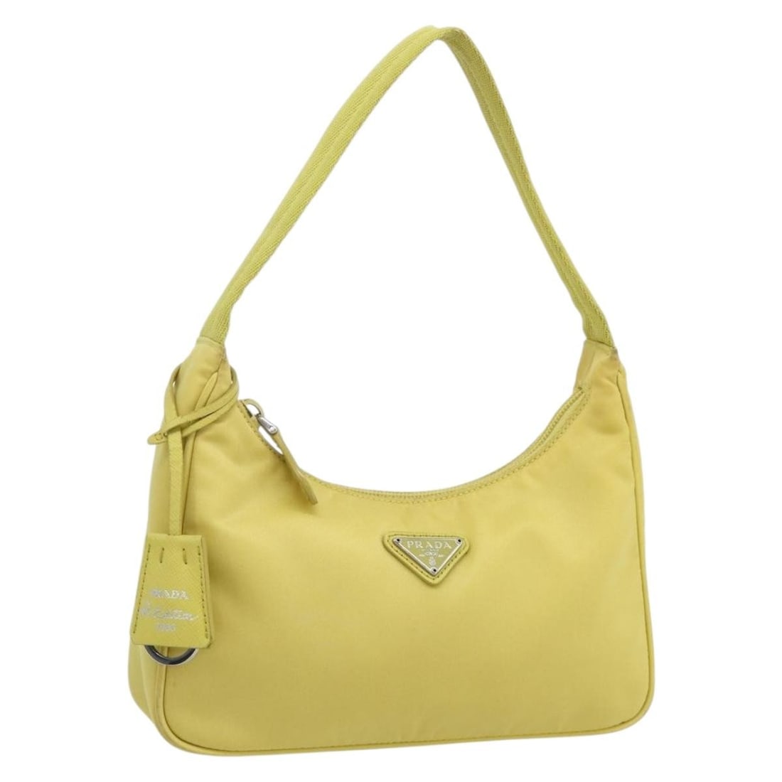 PRADA Yellow Nylon Hand Bag Made in Italy: PRADA Yellow Nylon Hand Bag Made in Italy Prada women's hand bag in yellow nylon, made in Italy. The bag measures approximately 22 cm W x 12 cm H x 5 cm D, with a handle drop of about 18 cm. It is off