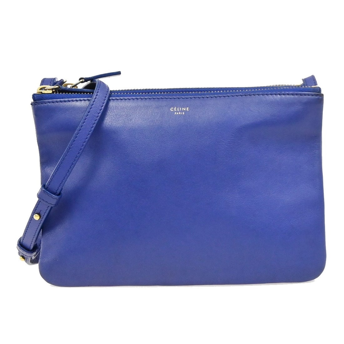 Celine Trio blue leather shoulder bag 21cm x 14cm x 3cm: Celine Trio blue leather shoulder bag 21cm x 14cm x 3cm Celine Trio leather bag in blue with a streamlined design and made in Italy. This pre-owned piece is in good condition, showing light wear to th