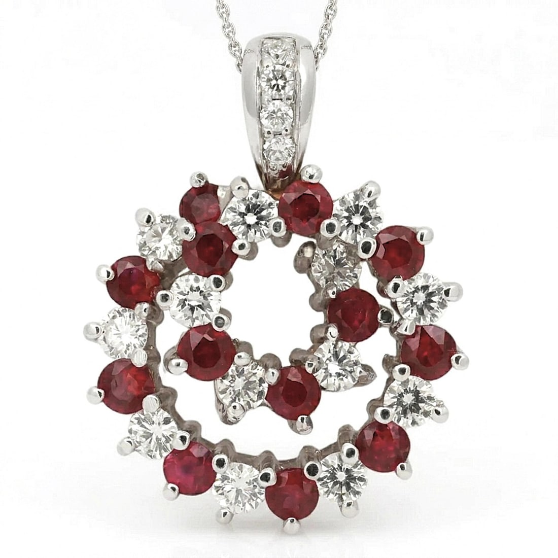 Spiral Pendant with Diamonds and Rubies in 14k White Gold by Rachel Koen: Spiral Pendant with Diamonds and Rubies in 14k White Gold by Rachel Koen This elegant Rachel Koen pendant features a captivating spiral design, adorned with round cut natural rubies and diamonds set i