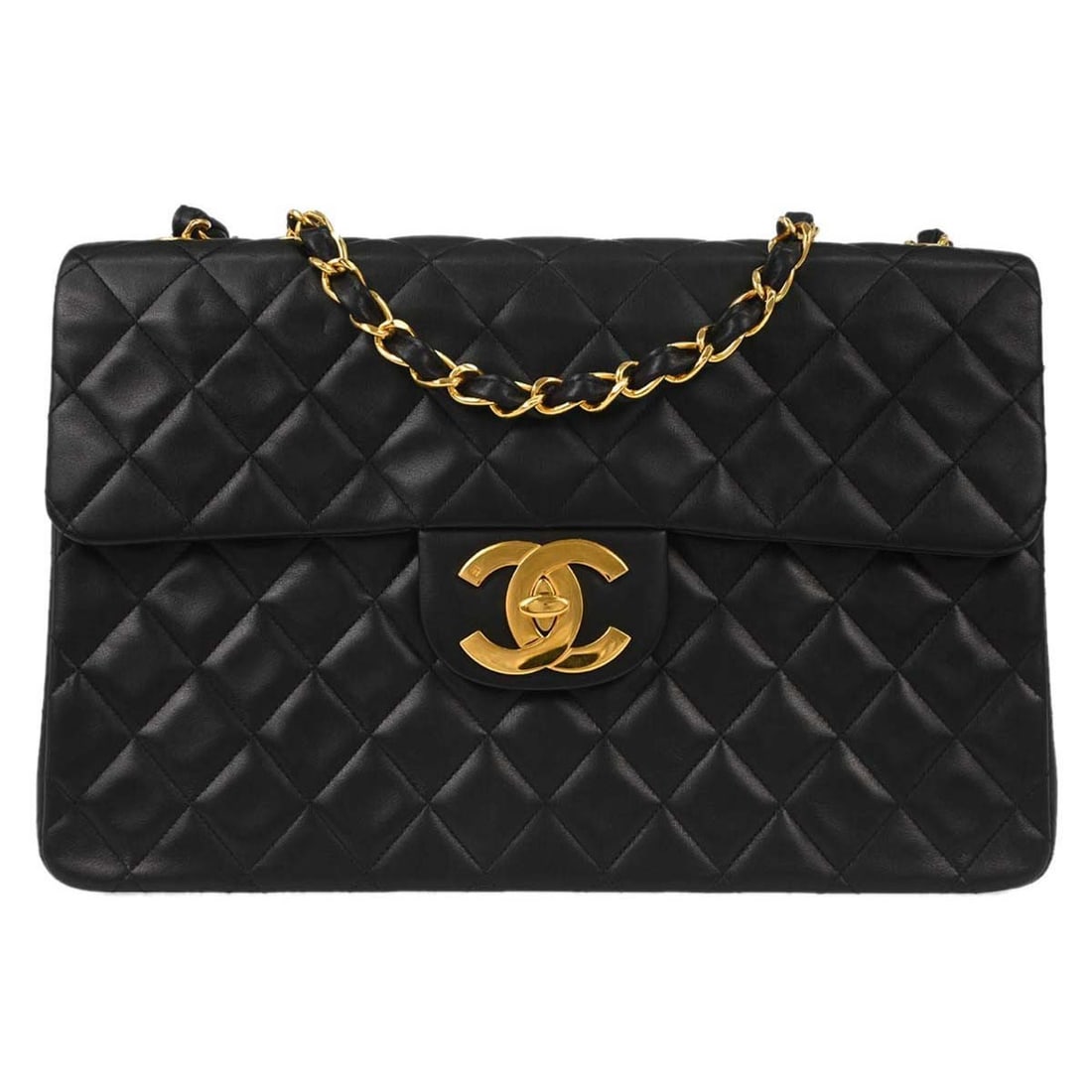CHANEL Classic Flap Maxi Shoulder Bag in Black Lambskin: CHANEL Classic Flap Maxi Shoulder Bag in Black Lambskin Chanel Classic Flap maxi shoulder bag in black lambskin leather with signature matelasse quilting and a turn-lock closure. Designed with a doubl