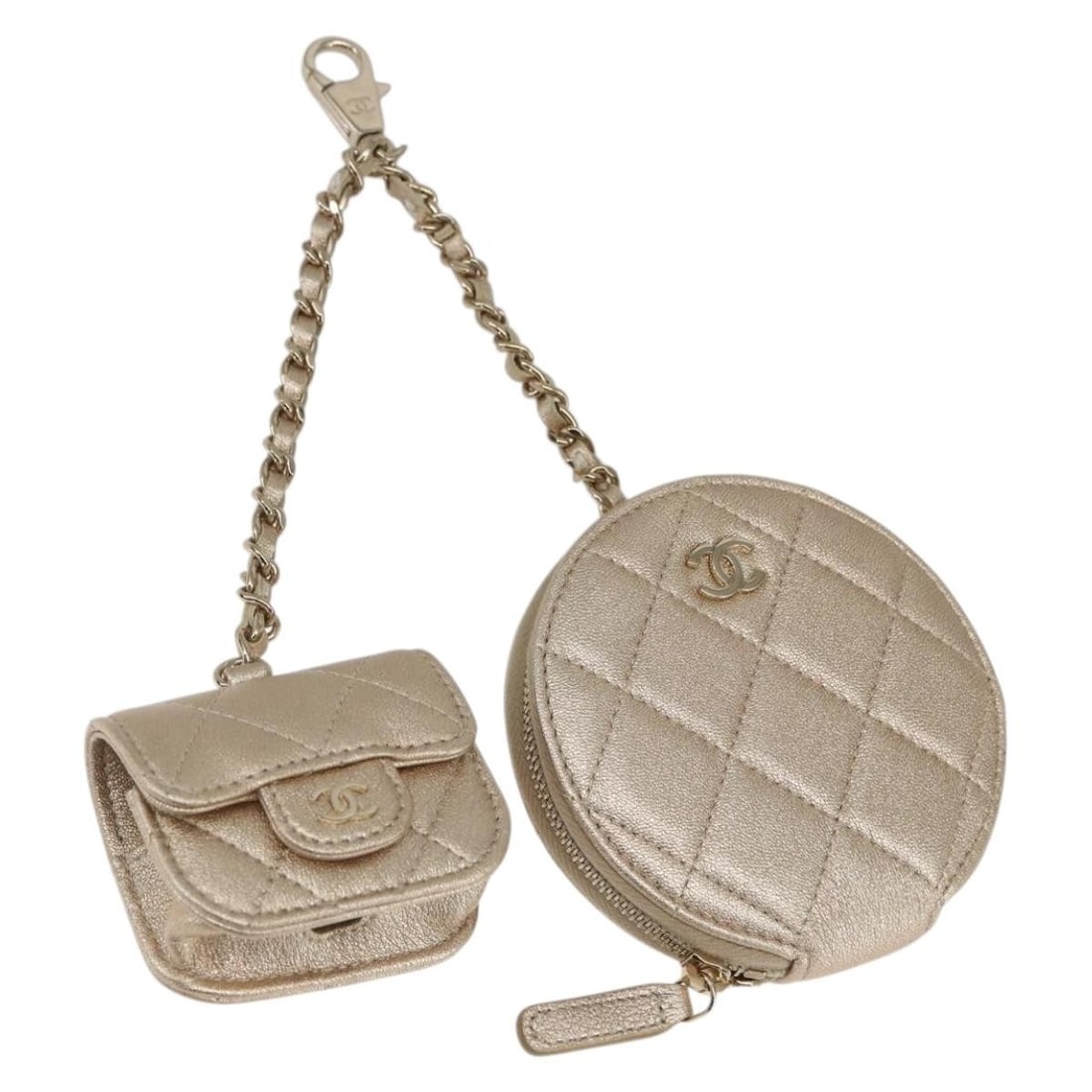 CHANEL Matelasse Leather Pouch Earphone Holder Champagne Gold CC Logo: CHANEL Matelasse Leather Pouch Earphone Holder Champagne Gold CC Logo This CHANEL Matelasse earphone case pouch is crafted from leather in a sophisticated champagne gold color. Featuring the iconic CC