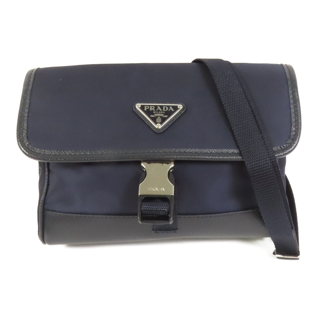 Prada 2ZH108 Blue Nylon Phone Shoulder Bag SHW: Prada 2ZH108 Blue Nylon Phone Shoulder Bag SHW A PRADA shoulder bag phone bag in blue nylon, designed as a unisex regular-size accessory. It features a blue exterior and frame color, with a shoulder s