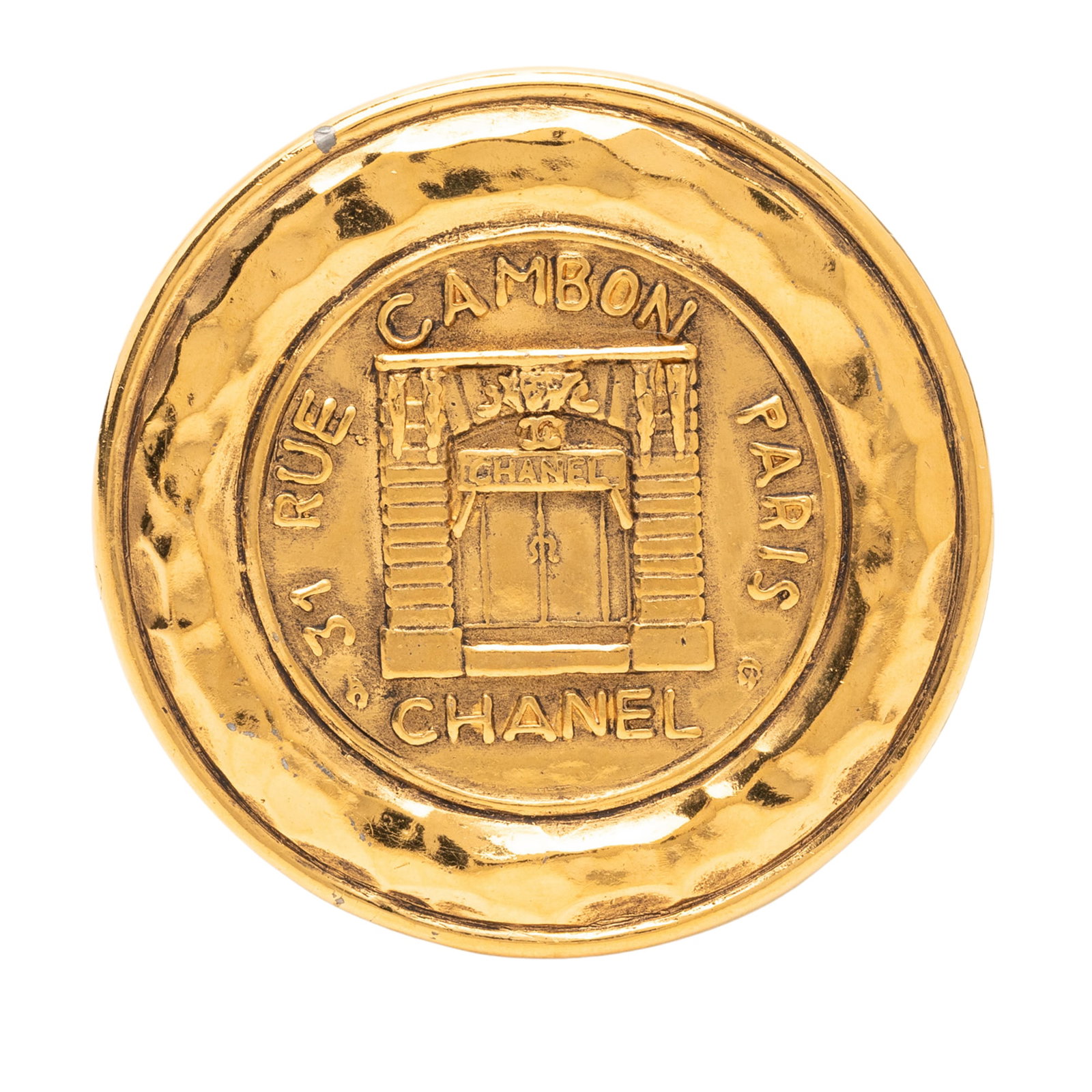 Chanel 31 Rue Cambon Gold Tone Medallion Brooch Pin: Chanel 31 Rue Cambon Gold Tone Medallion Brooch Pin Chanel 31 Rue Cambon medallion pin brooch with a gold plated finish and back pin closure. This costume jewelry piece is made in France and shows vis