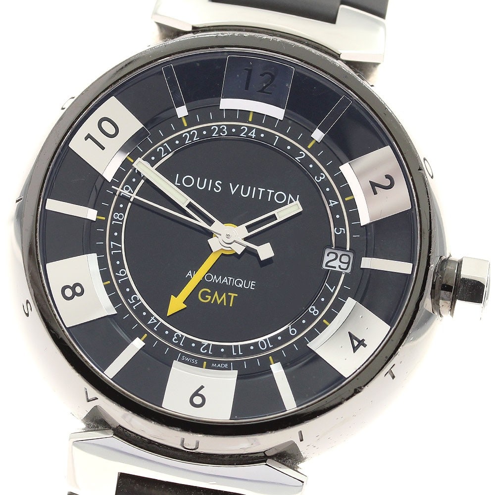 Louis Vuitton Q113K Tambour wristwatch for men GMT date: Louis Vuitton Q113K Tambour wristwatch for men GMT date Pre-owned Louis Vuitton Tambour in Black GMT Date men's wristwatch, made in Switzerland. It features a stainless steel case, rubber belt, black/