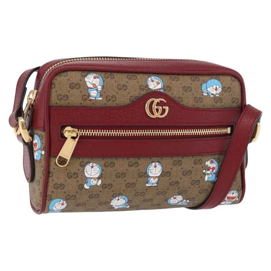 Gucci Doraemon Micro GG Supreme Beige PVC Shoulder Bag 647784: Gucci Doraemon Micro GG Supreme Beige PVC Shoulder Bag 647784 This GUCCI Micro GG Supreme Doraemon x Fujiko-Pro shoulder bag features a beige and gold colorway crafted from PVC leather and Micro Small