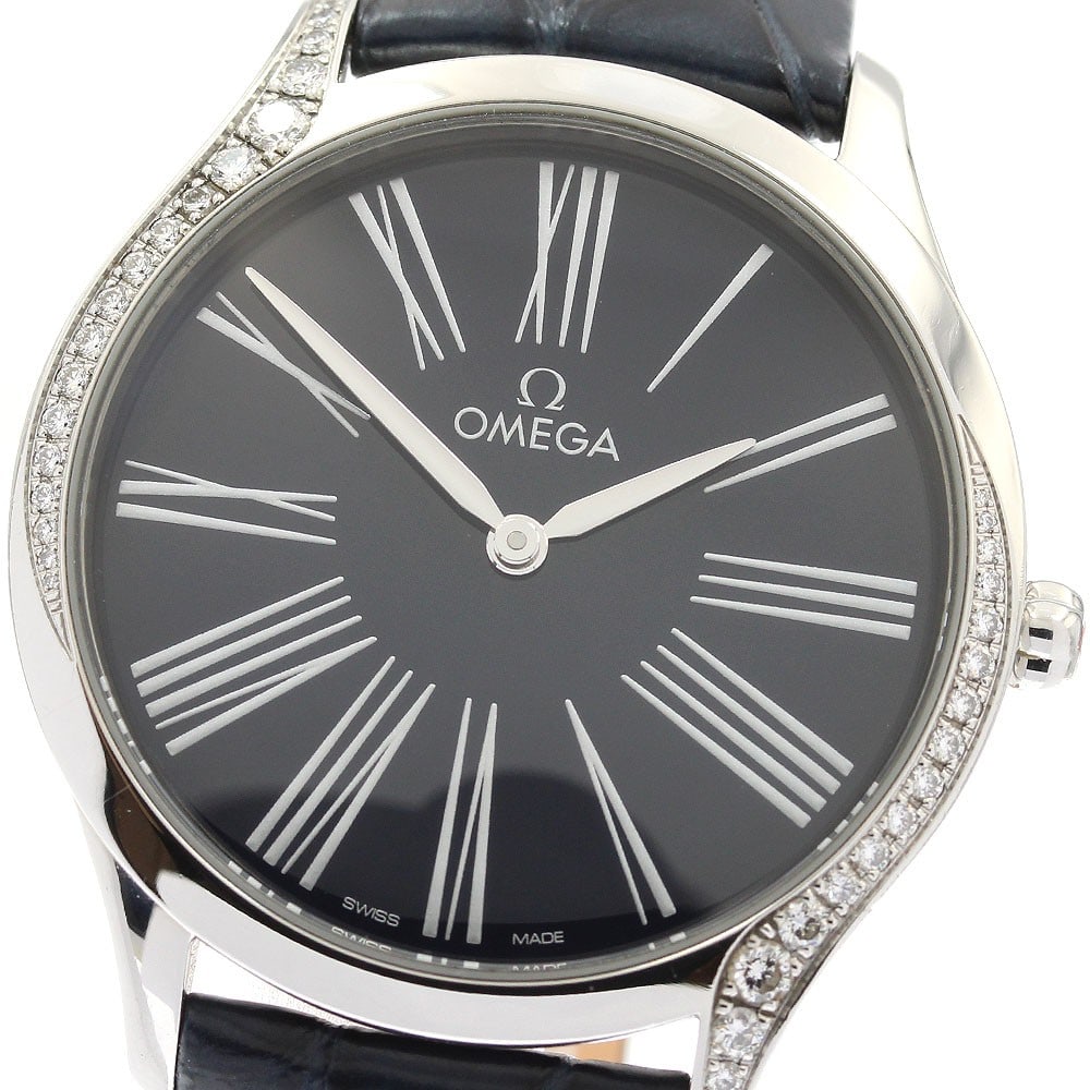 OMEGA De Ville Tresor womens quartz watch ref 428.18.36.60.03.001: OMEGA De Ville Tresor womens quartz watch ref 428.18.36.60.03.001 Pre-owned OMEGA De Ville Tresor ladies wristwatch with a diamond bezel and quartz movement. This Swiss-made watch features a stainless