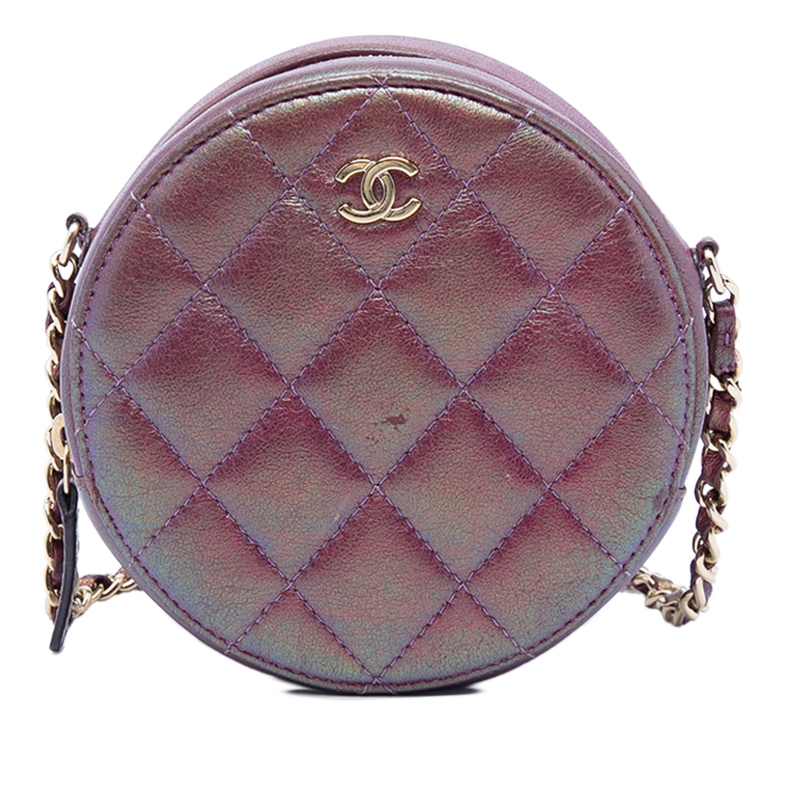 Chanel Round Chain Clutch in Purple Iridescent Quilted Lambskin: Chanel Round Chain Clutch in Purple Iridescent Quilted Lambskin Round Chanel clutch crafted in quilted iridescent lambskin leather with a leather-woven chain strap. The design features a top zip closu