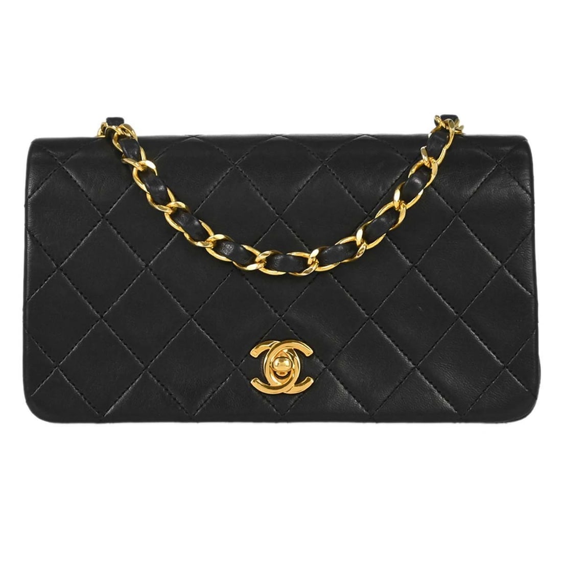 Chanel Full Flap Mini Shoulder Bag Black Lambskin Turn Lock: Chanel Full Flap Mini Shoulder Bag Black Lambskin Turn Lock Chanel Full Flap shoulder bag in black lambskin leather with a quilted matelasse finish and turn lock flap closure. This small bag features 