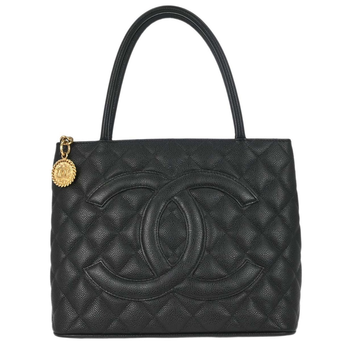 Chanel Medallion Tote Black Calfskin Handbag: Chanel Medallion Tote Black Calfskin Handbag A Chanel Medallion Tote designed for women, presented in black calfskin with a quilted finish. The bag was made in Italy and measures 30 cm x 25 cm x 15 cm