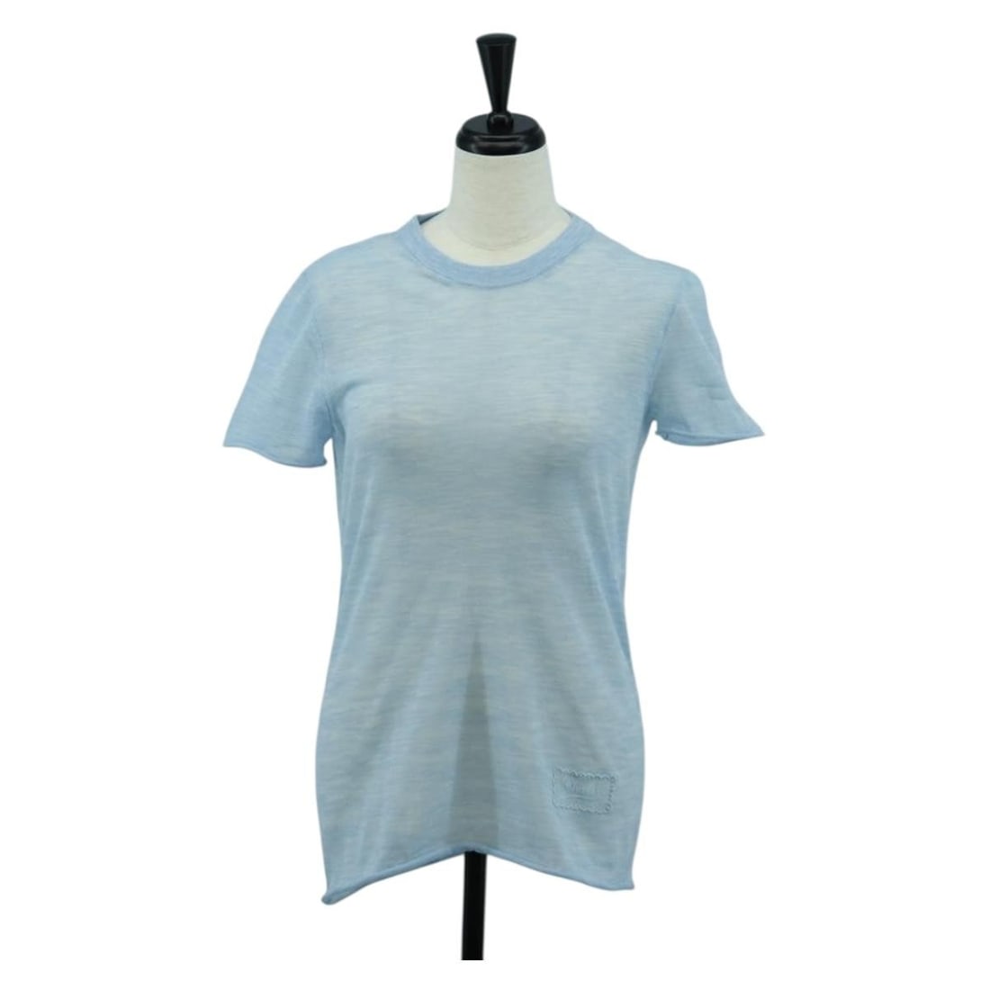 CHANEL CC Light Blue Cotton Short Sleeve Women's T Shirt: CHANEL CC Light Blue Cotton Short Sleeve Women's T Shirt Authentic CHANEL short-sleeved T-shirt in light blue cotton knit fabric for women. Made in Italy, this piece is offered in excellent condition 