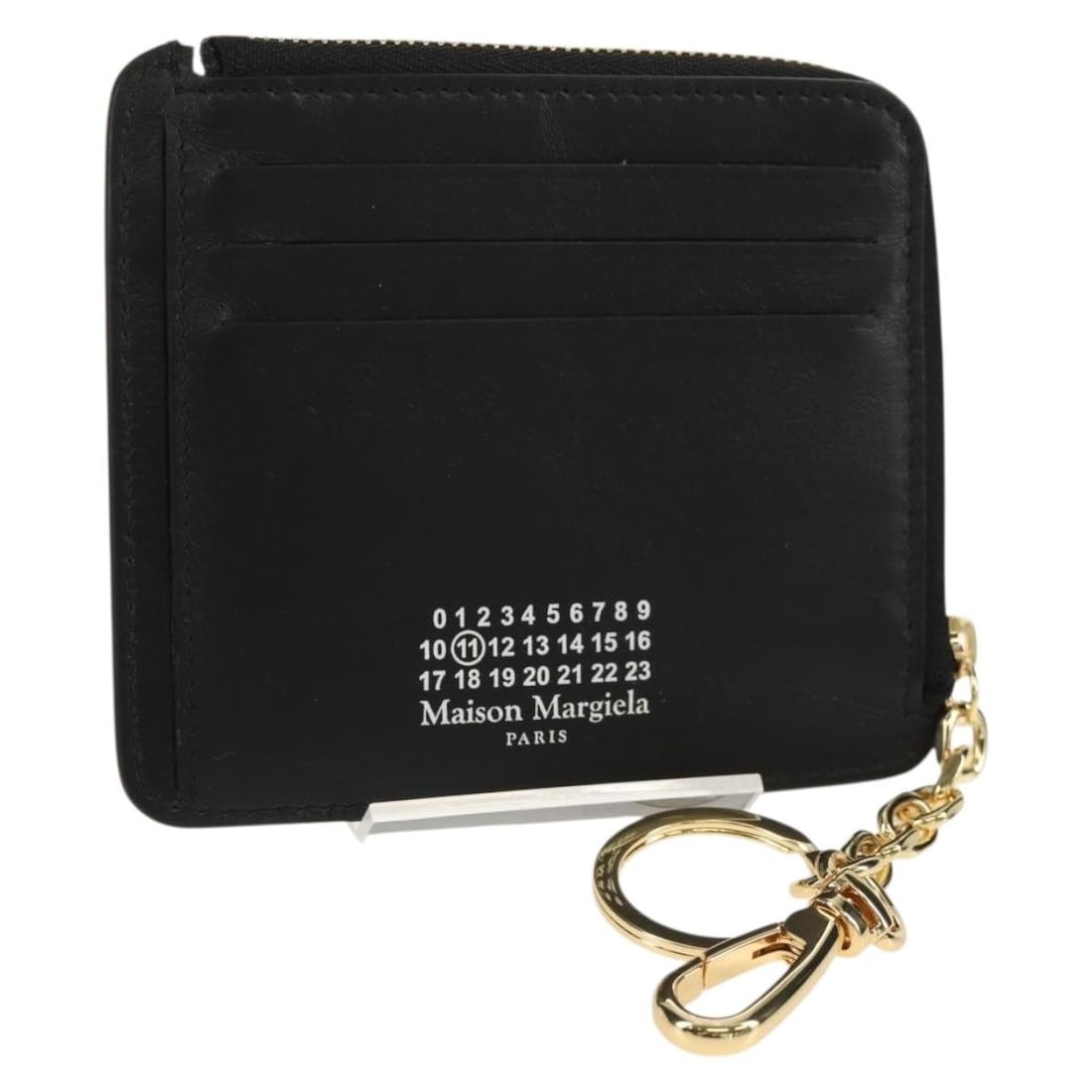 Maison Margiela 4 Stitch compact leather wallet black with box: Maison Margiela 4 Stitch compact leather wallet black with box Compact Maison Margiela 4 Stitch Fragment Case wallet crafted in black leather. Made in Italy, this women's wallet includes the dust bag 